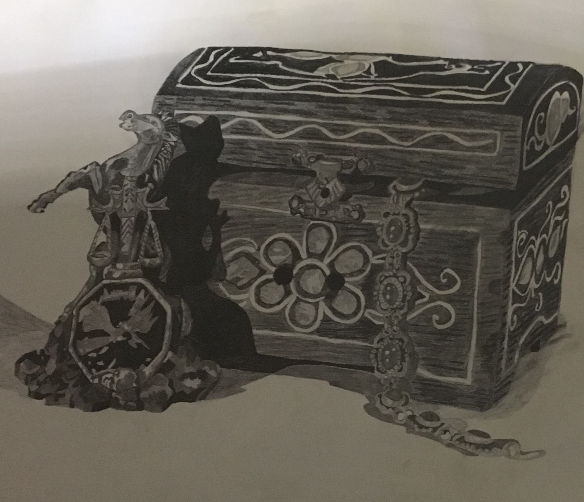 A pencil drawing: an ornamented wooden chest with a curved lid, a seated cat figurine, a horse figurine and a pair of scales in front of it, and a chain spilling out of the chest.
